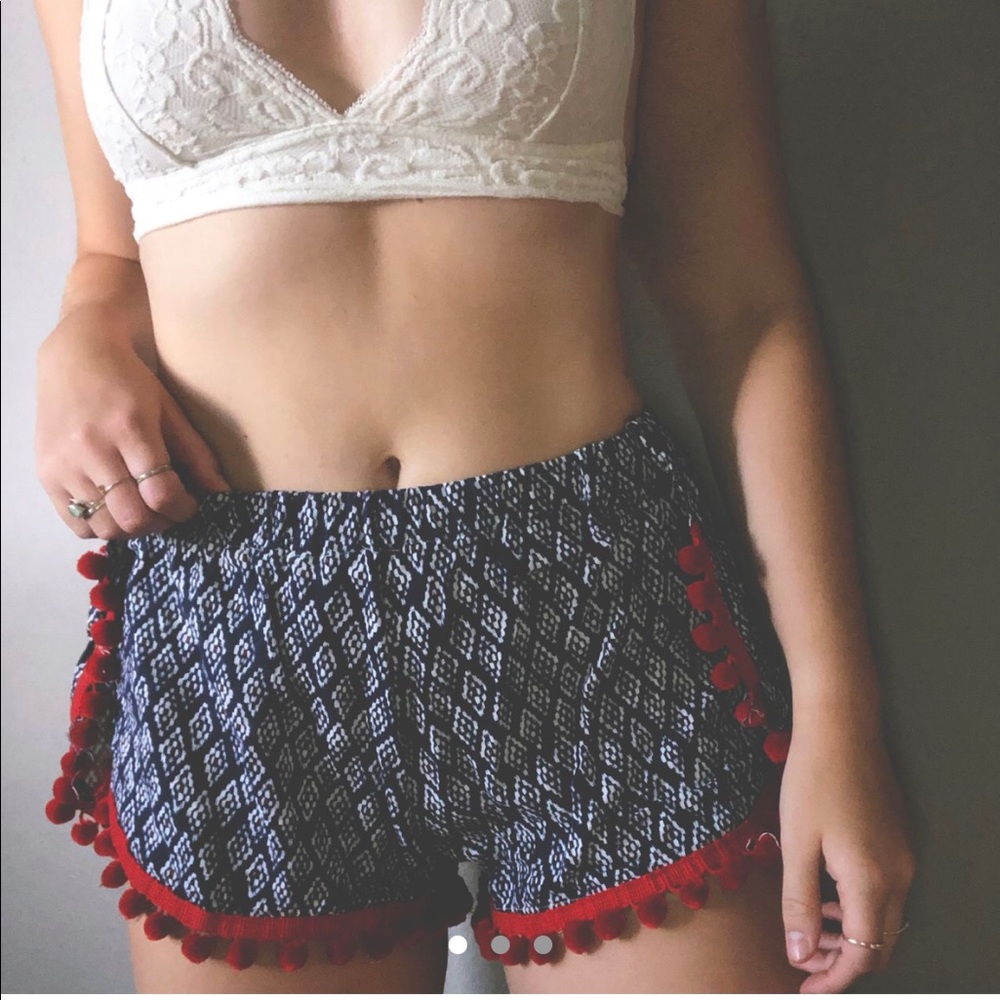 Adorable pattern shorts with pom poms